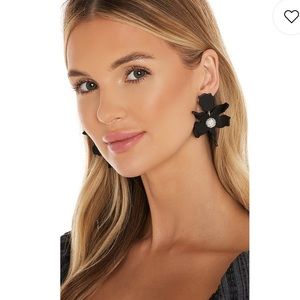 Black crystal lily clip on earrings